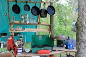 Rocket stove and propane stove in an outdoor kitchen | Homestead Honey