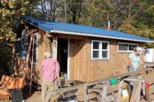 A work party to finish the insulation and siding on our 350 square foot tiny home (October 2013) | Homestead Honey