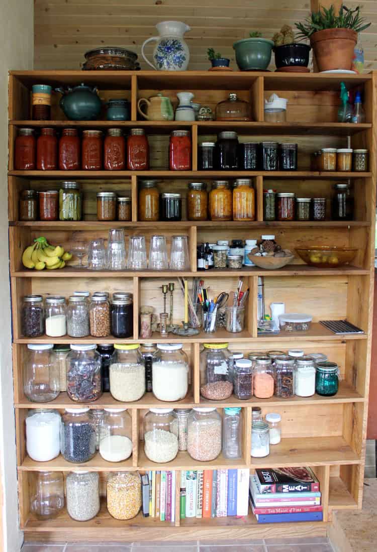 Storing canned goods in our custom built homestead pantry.