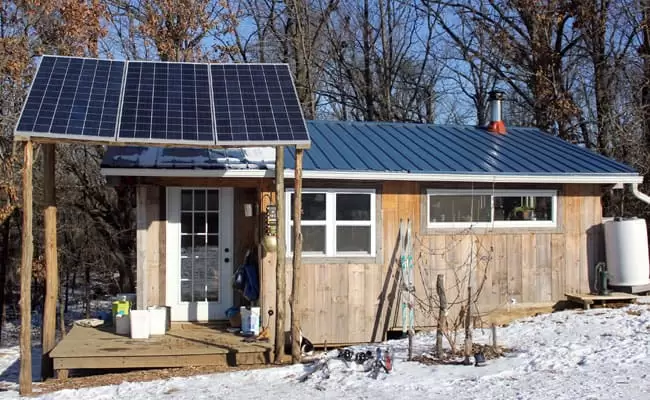 Three photovoltaic panels power our off grid tiny house in NE Missouri | Homestead Honey
