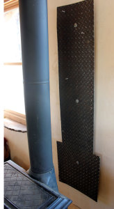 Heat Shield for the Jotul woodstove in our tiny house | Homestead Honey