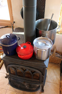 Pots of water on the homestead woodstove | Homestead Honey