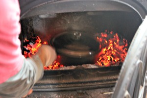 The key to a successful wood stove bake is coals that are hot, but not too hot! | Homestead Honey