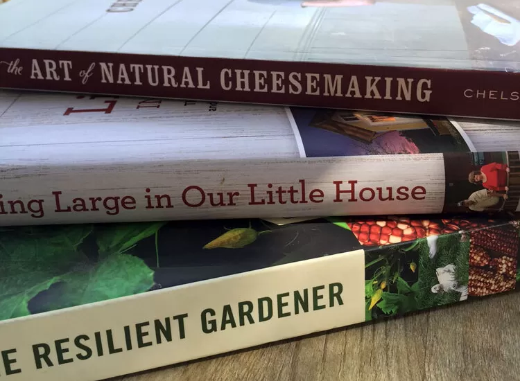 Looking for a few homesteading books and eBooks to enjoy reading this summer? Here are book reviews of a few excellent homesteading and gardening selections. | Homestead Honey