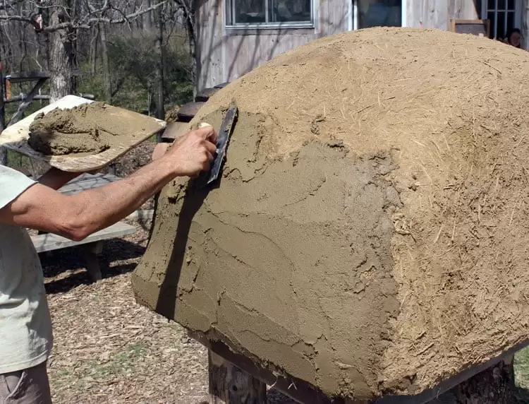 Applying finish plaster to our outdoor pizza oven | Homestead Honey