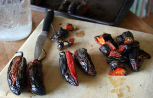 After fire roasting jalapenos, they are chopped and prepared for fermentation. | Homestead Honey