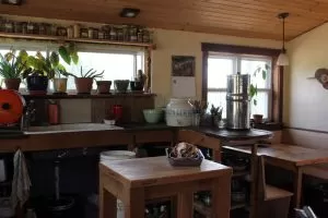 The sunny kitchen in the off the grid homestead