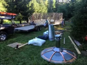 Various parts of the 25 ft yurt that we raised on our off the grid homestead